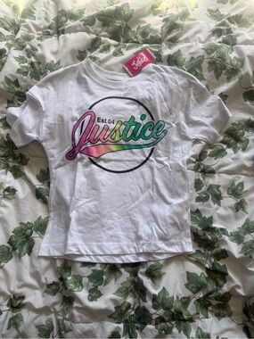 Justice White Tee with Rainbow Script Logo. NWT